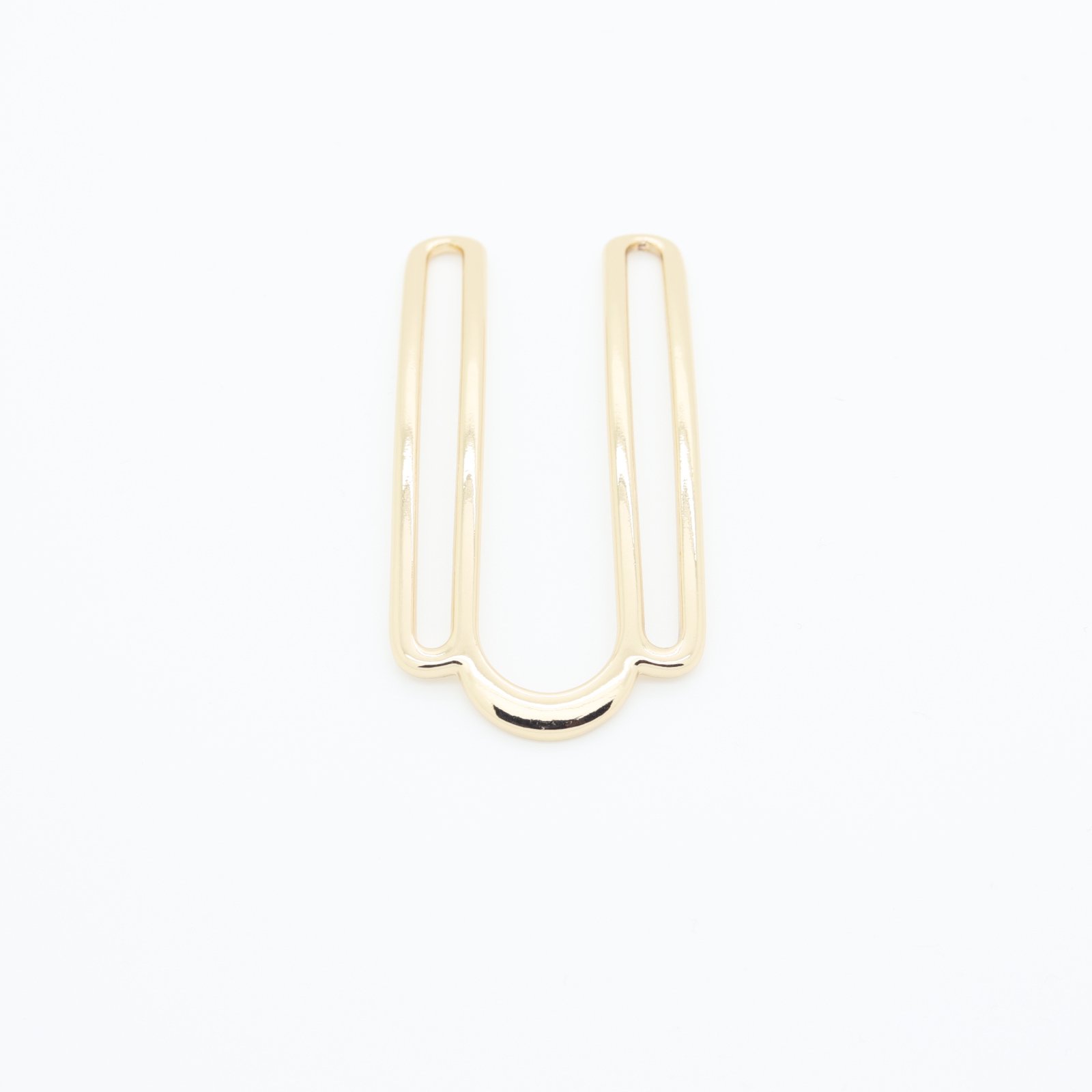 Séparateur en métal doré en forme de U