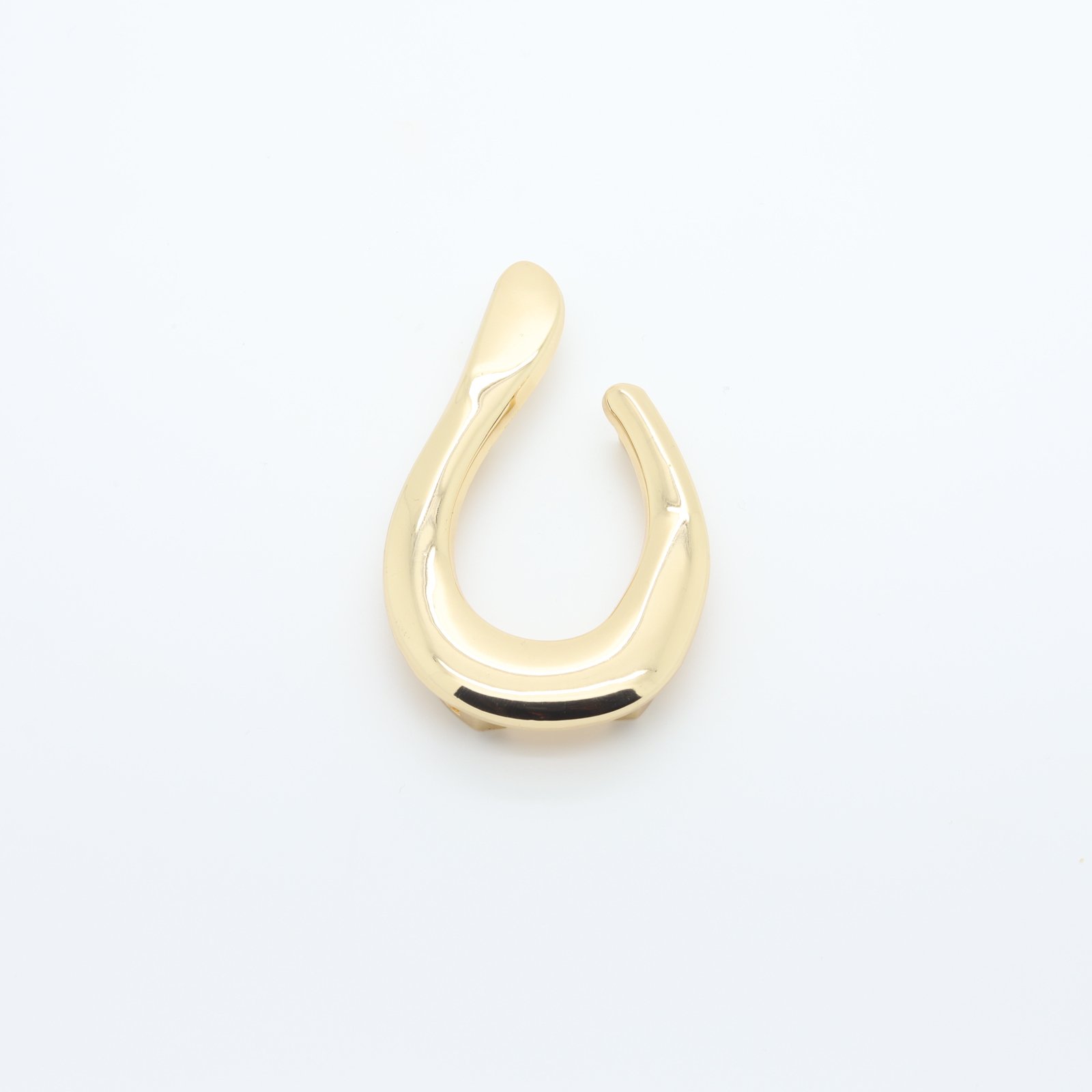 Lazo metálico dorado en forma de U