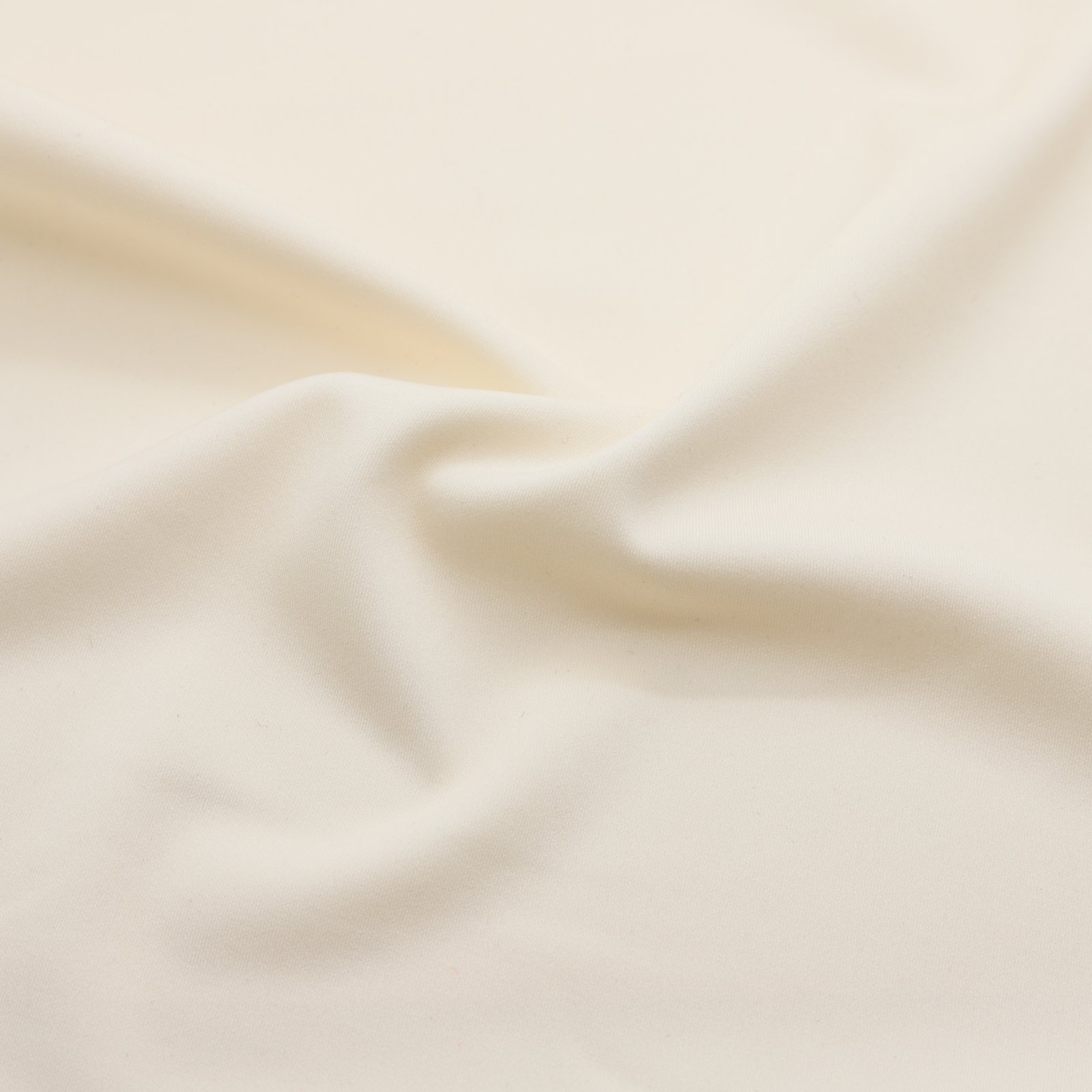 Tissu microfibre extensible blanc cassé
