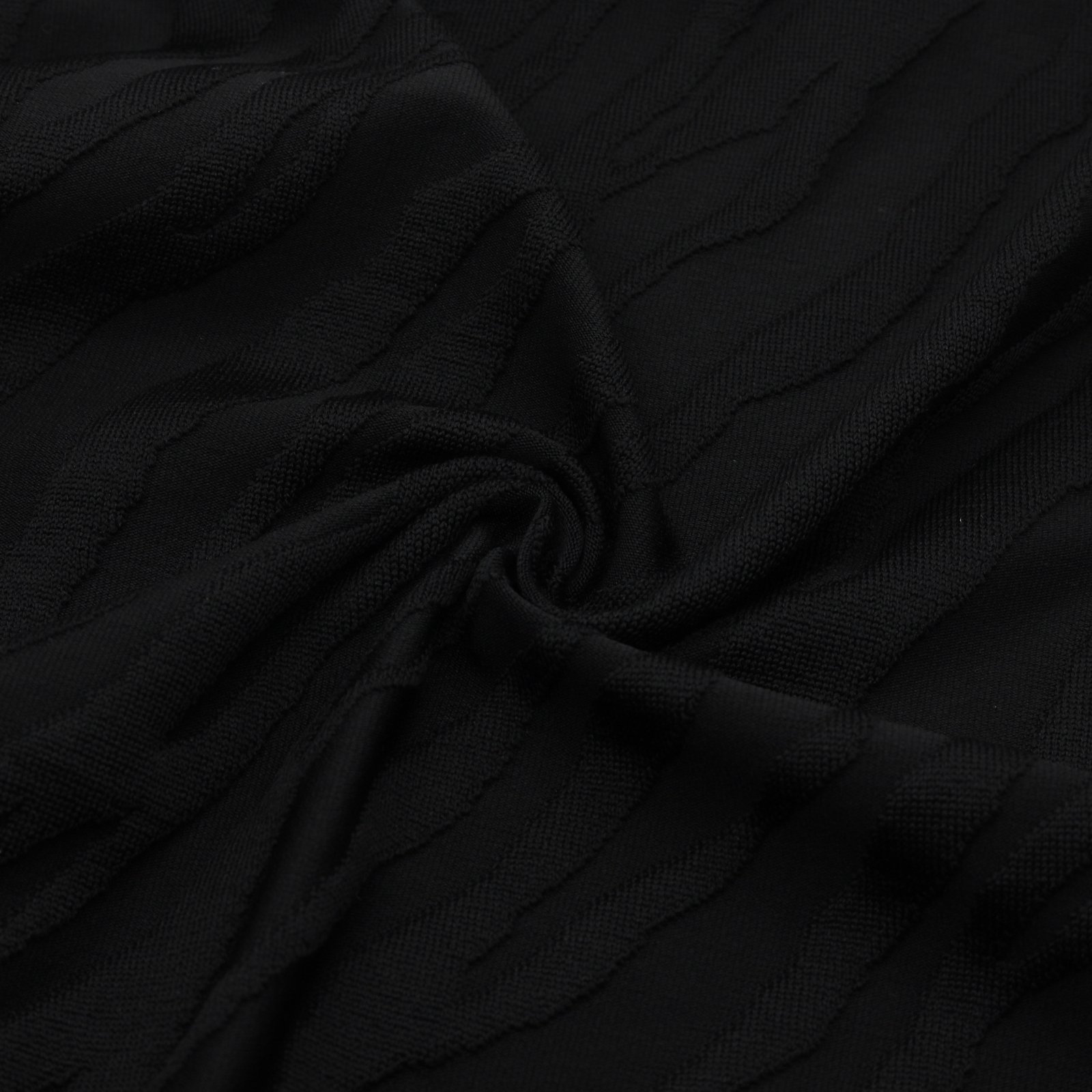 Tissu en maille jacquard texturée à motif zèbre noir