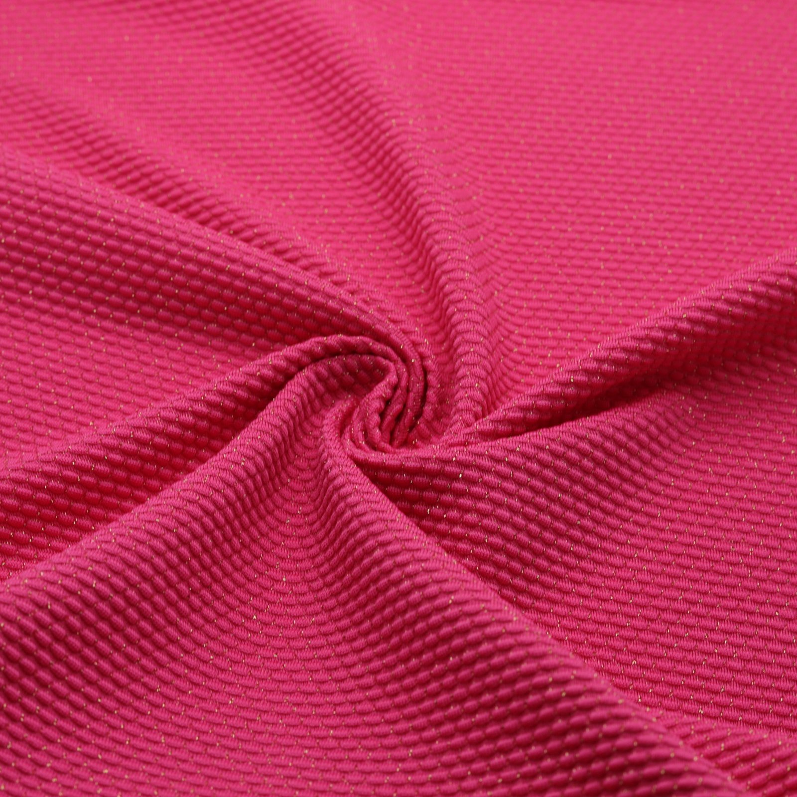 Tissu en lurex texturé or et rose