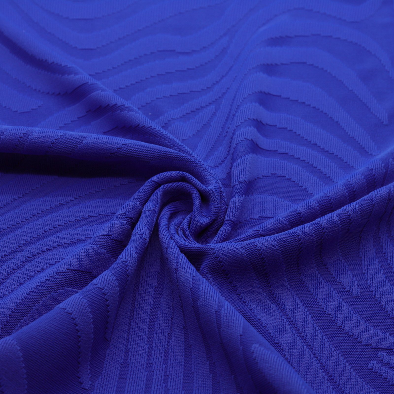 Tessuto a maglia jacquard blu reale con motivo a onde