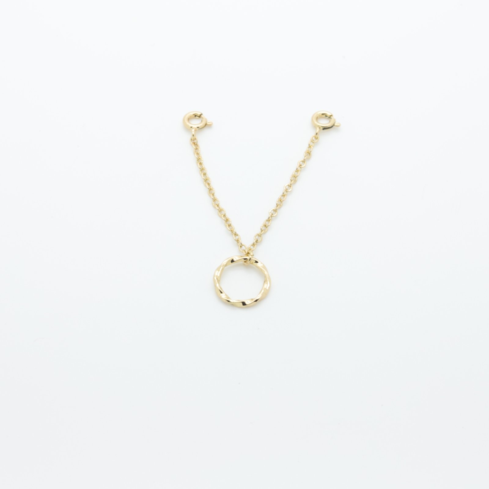 Chaîne bijou en métal doré avec anneau central