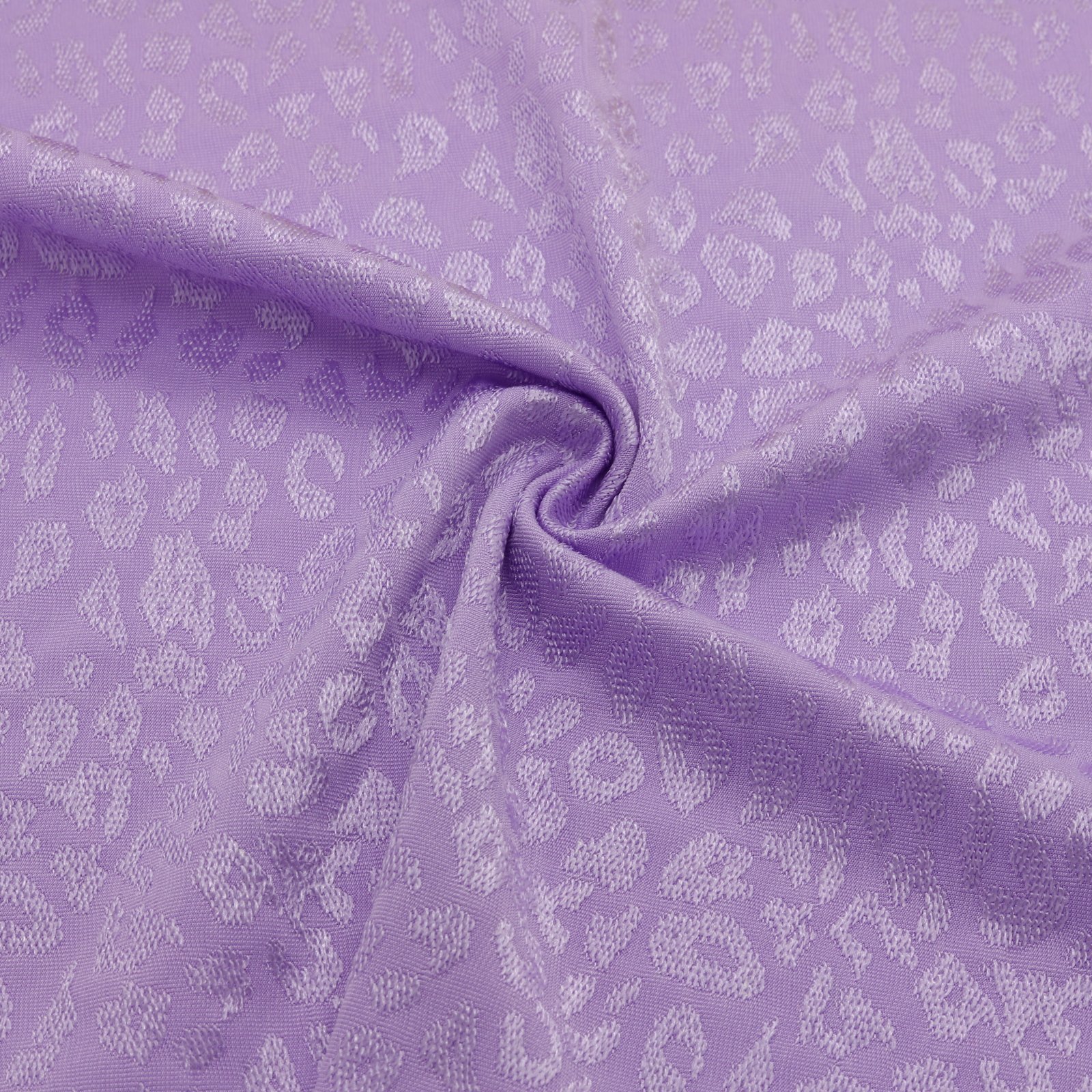 Tissu jacquard violet extensible léopard