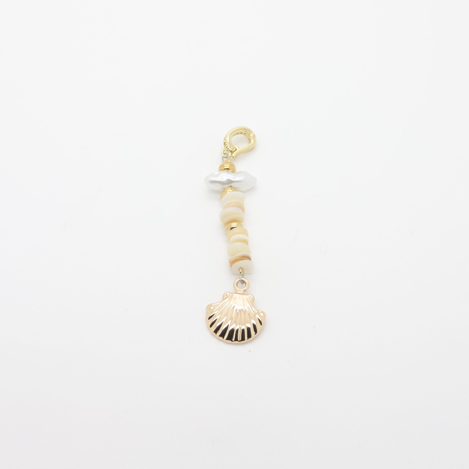 Bijou de maillot de bain doré à coquillage