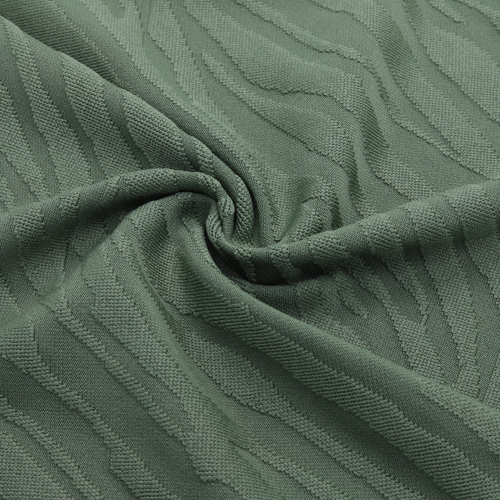 Tissu jacquard vert à motif en relief
