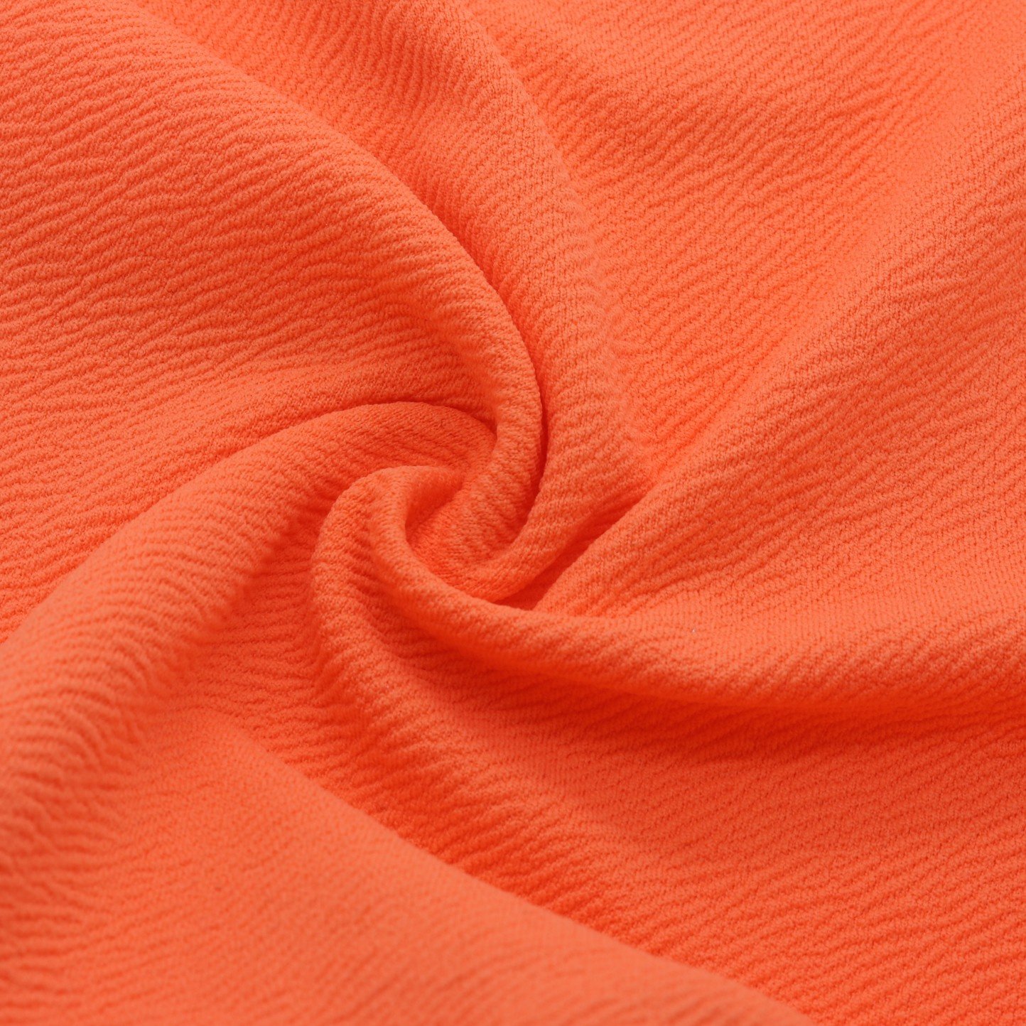 Tissu jacquard jaune extensible en polyester recyclé à l’aspect texturé et structuré