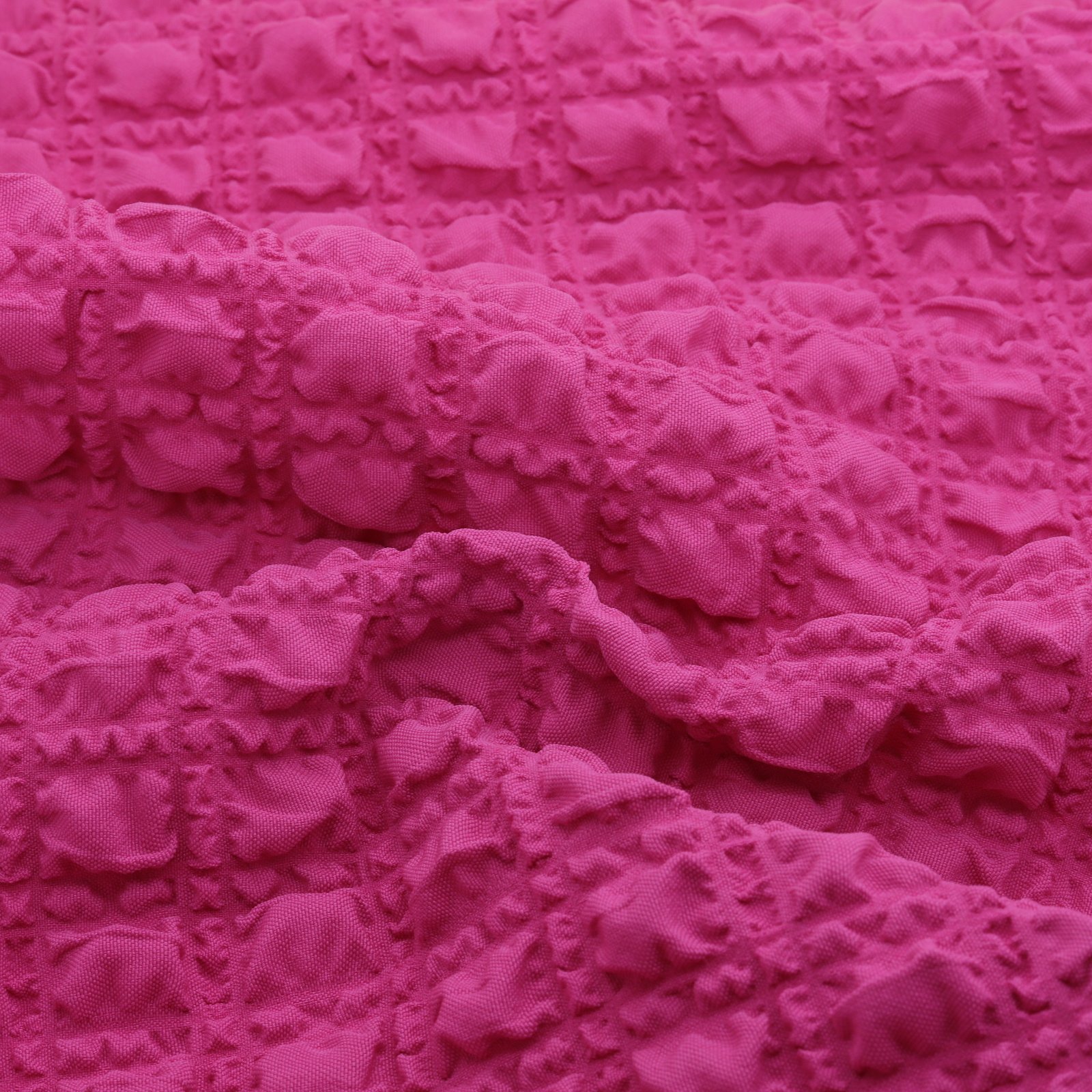 Tissu jacquard rose texturé