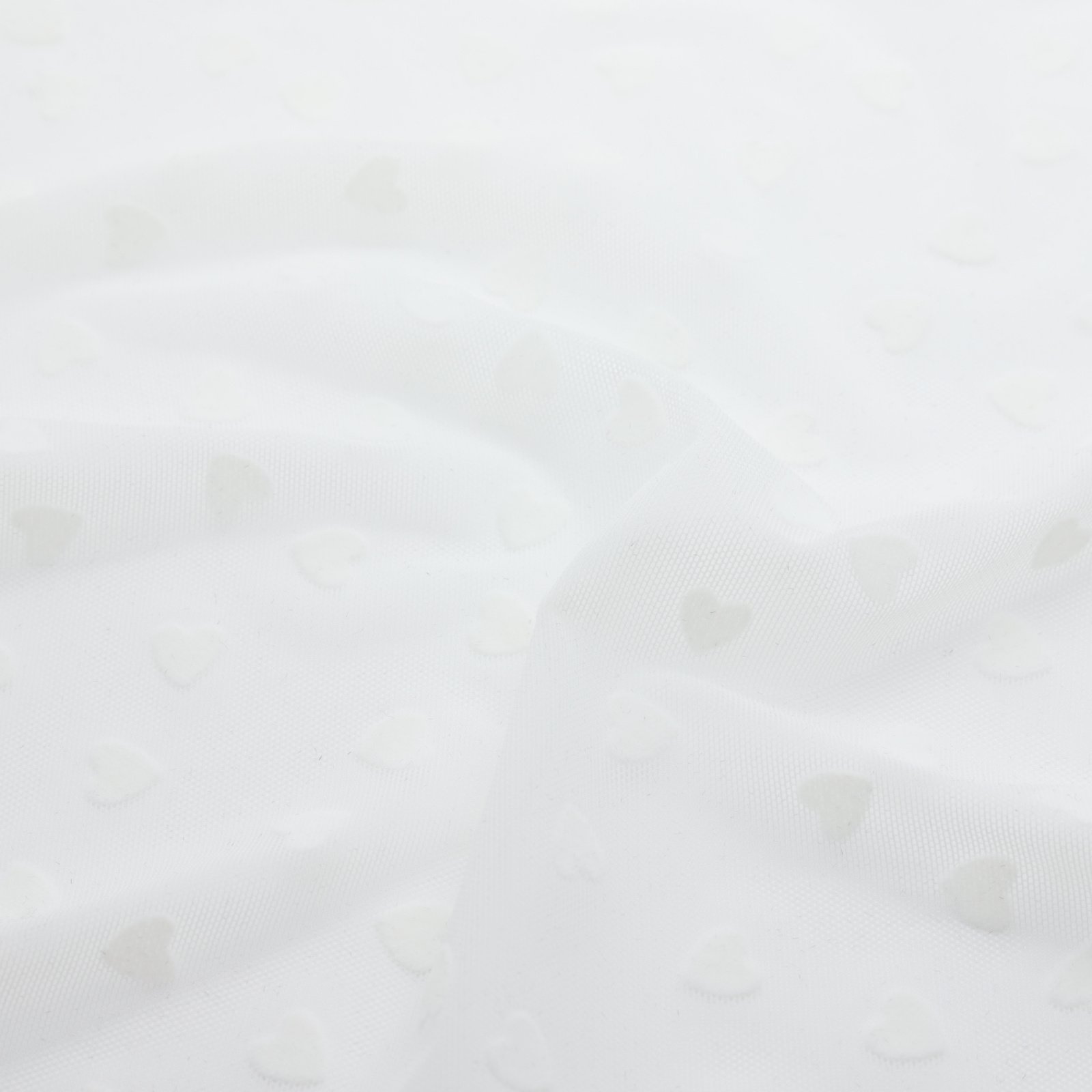 Tissu en résille extensible avec flocage cœur velours