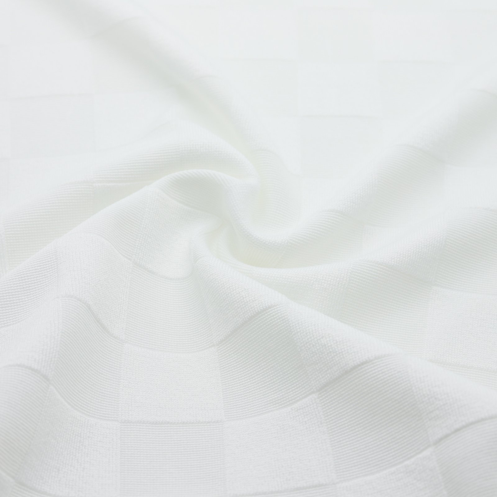 Tissu en jacquard texturé motifs carreaux blanc