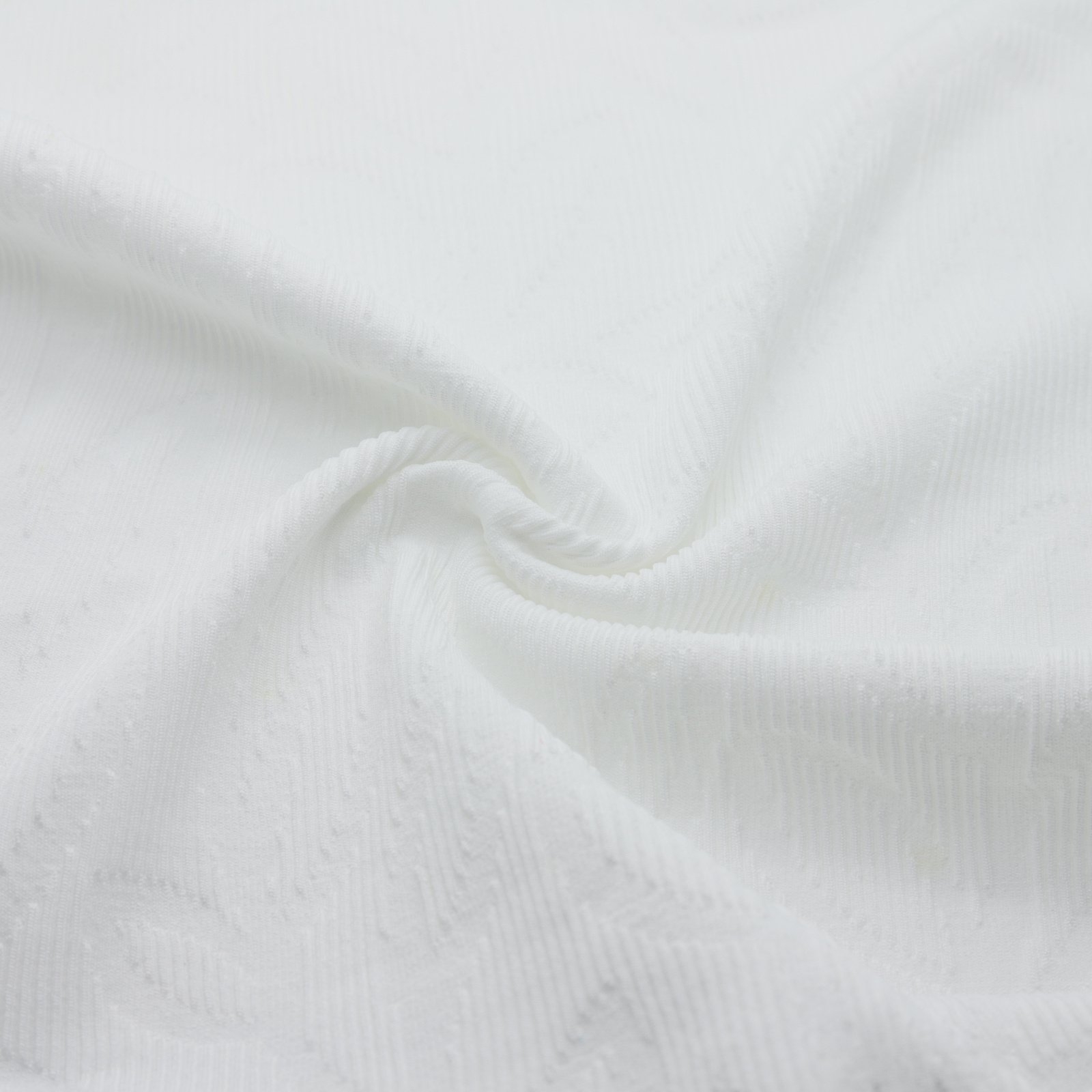 Tissu jacquard texturé motif feuille